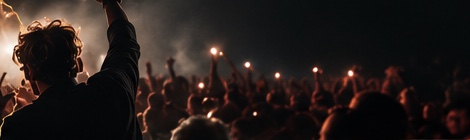 Audience at a concert in night light